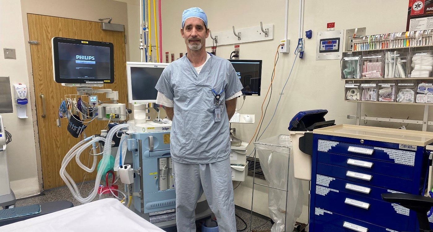 Kevin Dalgliesh, Anaesthesia Assistant at Osler, poses in an operating room