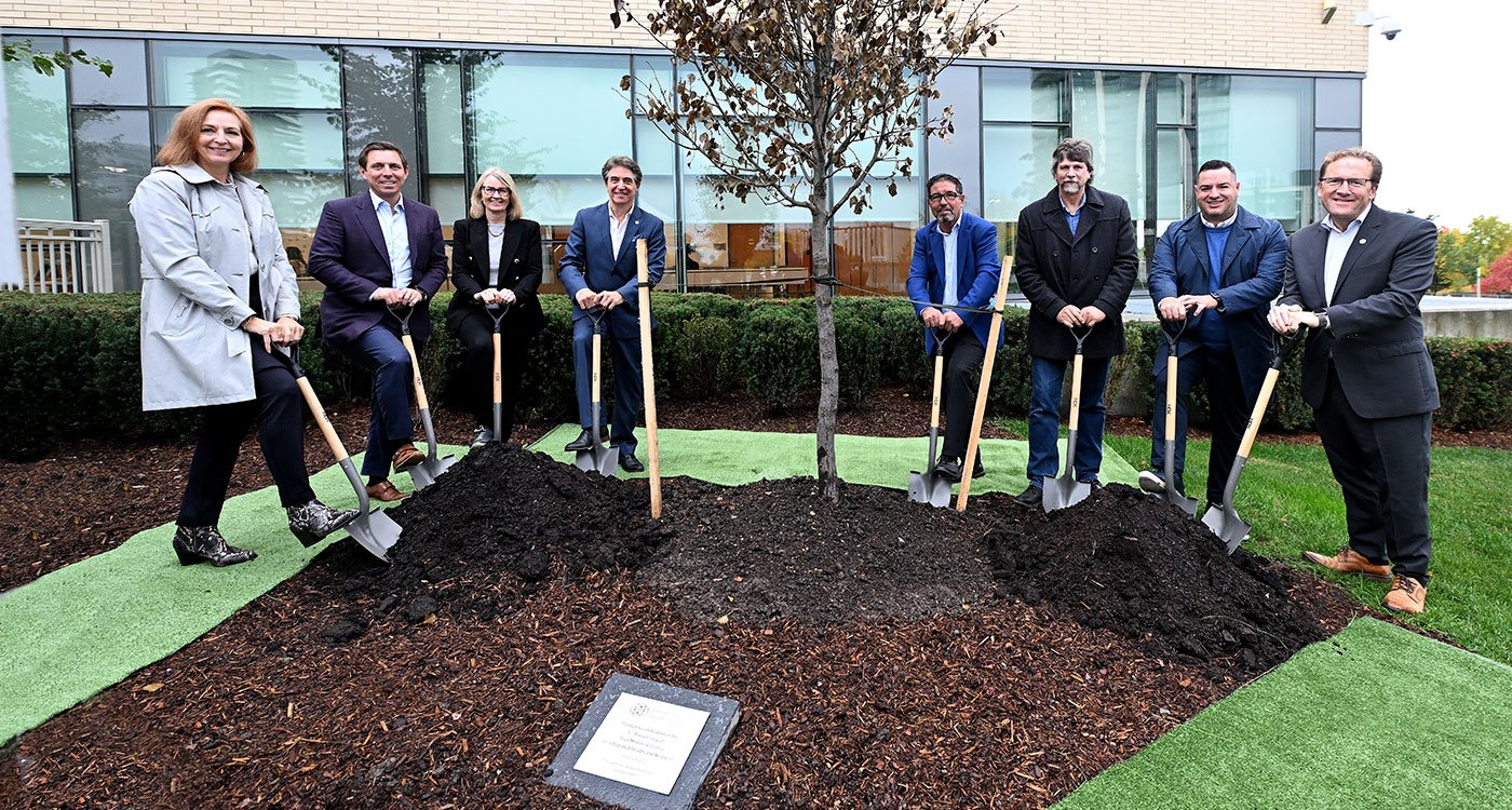 Provincial and local dignitaries, along with Osler and Osler Foundation leaders, planted a commemorative flowering pear tree on the grounds of Peel Memorial