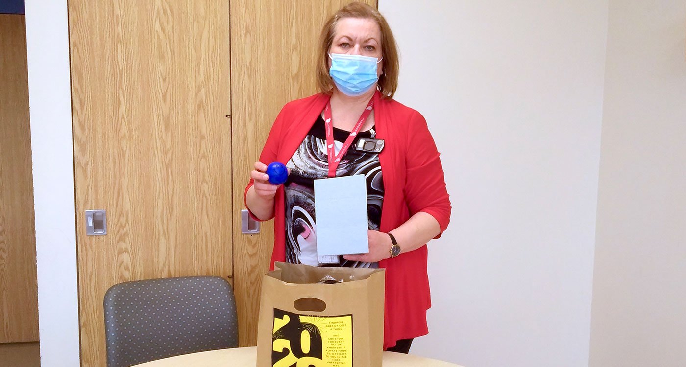 Valerie, a Recreation Therapist in the Mental Health and Addictions program at Etobicoke General, is pictured with one of her emotional regulation kits