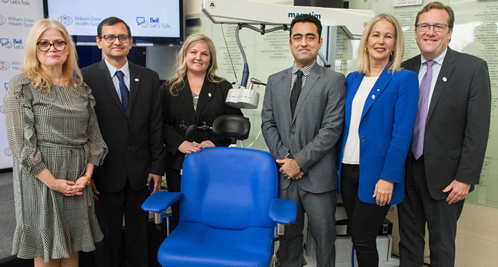 (l-r) Kiki Ferrari, Clinical Operations; Dr. Razi Sayeed, Psychiatry; Shelley Hofer, rTMS patient, Dr. Prakash Babani, Psychiatry; Mary Deacon, Chair, Bell Let’s Talk; and Ken Mayhew, Osler Foundation.