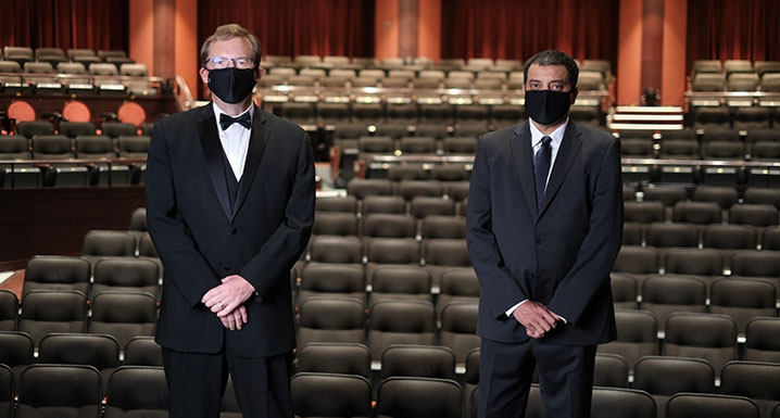 (l-r) Ken Mayhew, President and CEO, William Olser Health System Foundation and Naveed Mohammad, President and CEO, William Oler Health System wearing masks and social distancing on the stage at the Rose Theatre in Brampton