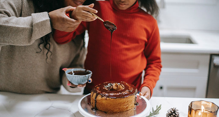 A mother and daughter baking together