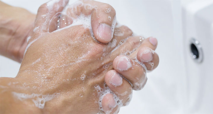 A man washing his hands