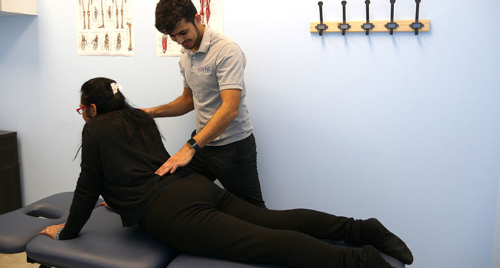 Advanced Practice Provider, Chirayu Desai examines a patient at his clinic