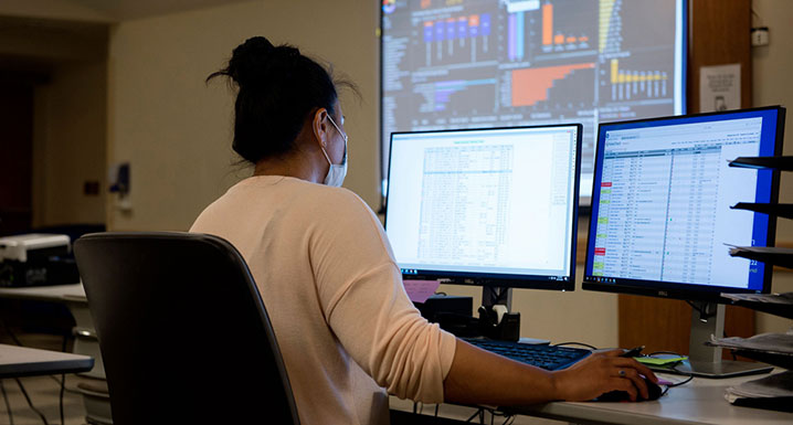 Staff member working the command centre