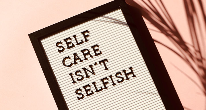 Sign that reads self care isn't selfish