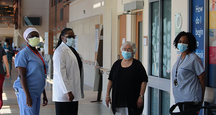 Oncology patient, Jane Esodo stands with Wendy Edwards, Nurse Practitioner with Osler’s Nurse Led Outreach Team, Joan Reid and Loretta Manful, Geriatric Emergency Medicine Nurses at Brampton Civic Hospital