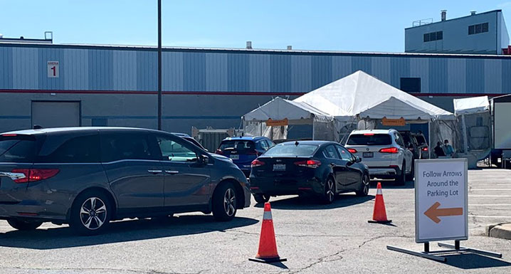 Cars line up at the South Fletchers Drive-Thru Assessment Centre