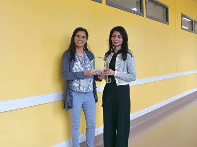 (l-r): Hina Marsonia, Pharmacist, presents Chris Varughese, Nurse Practitioner, with her Values Champion Award for Collaboration