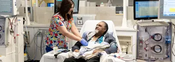 Nurse providing care to a renal patient