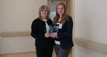 (l-r): Wanda Leah, Clerical Associate, accepts Values Award from Erin Stanners-Moroz, Clinical Lead, Mental Health Outpatient Program
