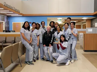 Staff from Osler's Outpatient Department at Etobicoke General Hospital pose with their Values Champion Award